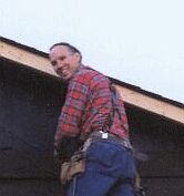 Dave working on a house.